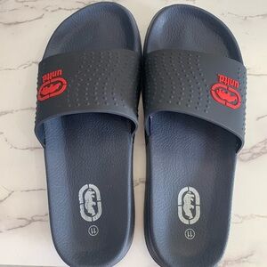 Men’s Unitd. Black and‎ Red Slip Ons Size L